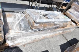 Seven new scratch and dent items including pan rack and wire shelves. Wrapped on pallets, marked with lot number 134.