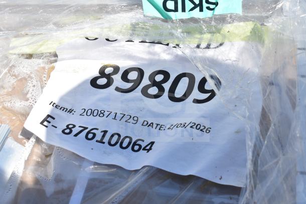 Plastic-wrapped label showing item number 89809, item# 200871729, and date 2/03/2026. Auction for 7 new scratch and dent items.