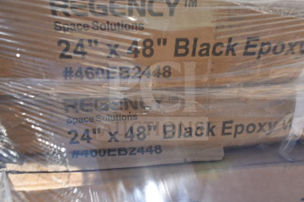 Boxes marked "Regency Space Solutions, 24" x 48" Black Epoxy," indicating scratch and dent items including pan racks and wire shelves.