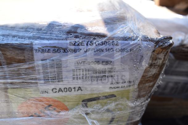 Shrink-wrapped package with visible label showing "522ETS309062," referencing steel table. Condition: scratch and dent.