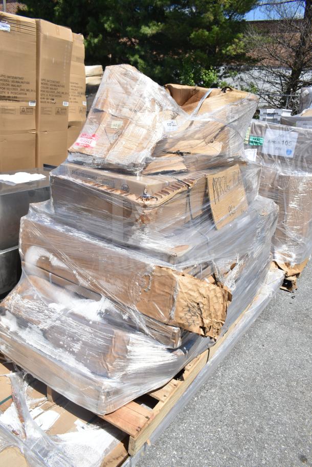 7 brand new scratch and dent items wrapped on a pallet, includes sheet pan rack and tabletop, with visible markings and labels.