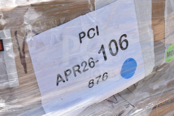 Plastic-wrapped pallet with a label showing "PCI APR26-106" and "876," containing brand-new scratch and dent items.