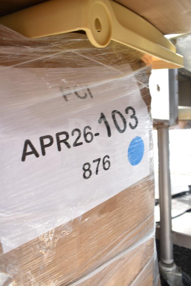 Auction pallet with beige can, ice bin, labeled "APR26-103 876" wrapped in plastic. New, scratch and dent items.