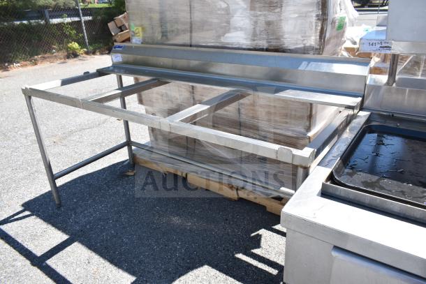 Stainless steel cutting table frame, rectangular, sturdy design, excellent condition, no visible wear, labeled "Universal."