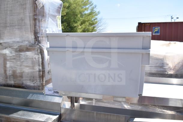 Commercial prep table with four round cut outs, two drawers with sauce pot cut outs on commercial casters.