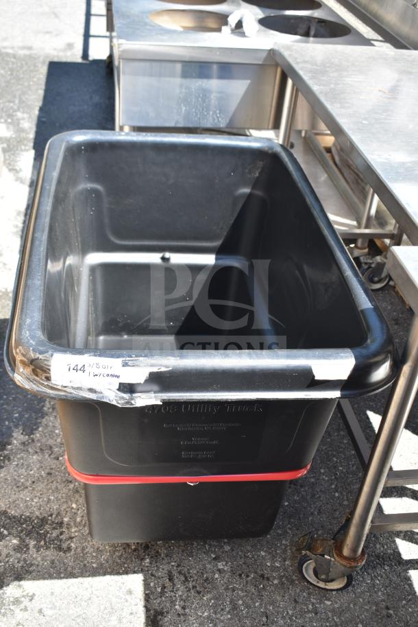 Rubbermaid® FG470800BLA black 8 cu. ft. utility cube truck, 700 lb. capacity, brand new, minor scratches, visible label.