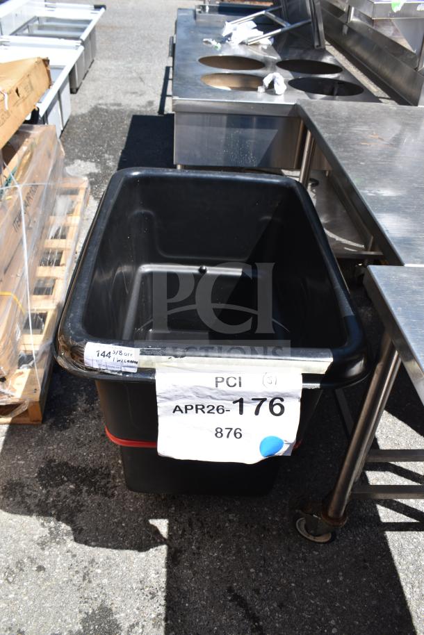 Rubbermaid FG470800BLA Black 8 Cu. Ft. Utility Cube Truck, 700 lb. capacity, slight scratches, auction tags visible.