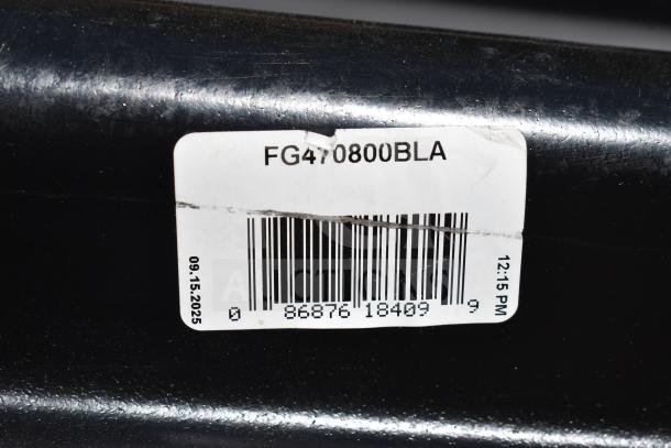 Alt text: Rubbermaid FG470800BLA Black 8 Cu. Ft. Utility Cube Truck label, barcode visible, scratch and dent condition.