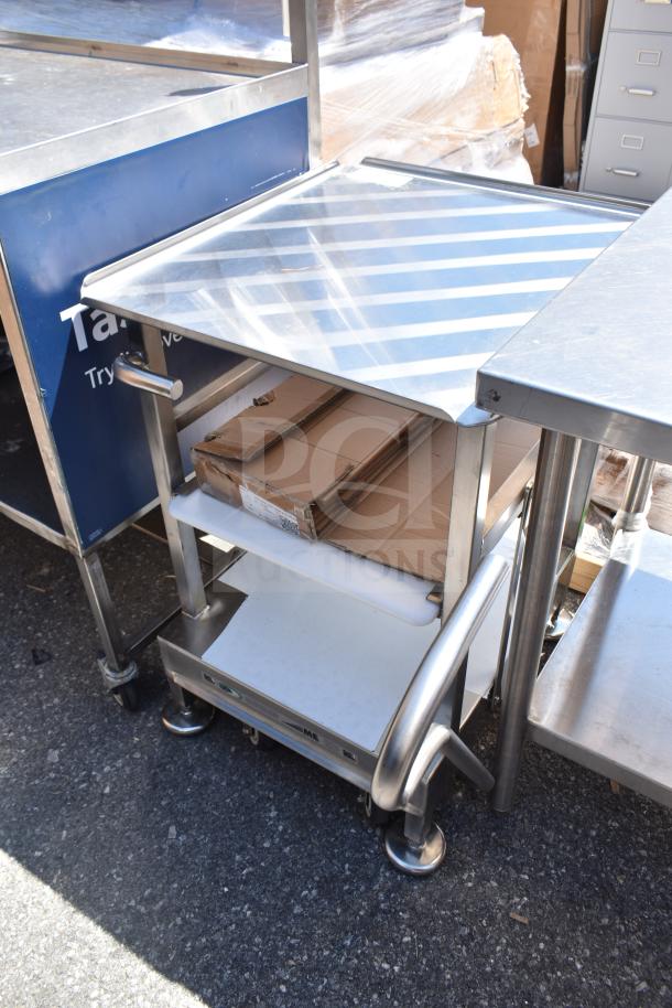 Face to Face Commercial Meat Slicer Equipment Stand, stainless steel, multi-tier design, with caster wheels for mobility.