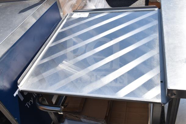 Face to Face commercial meat slicer equipment stand, stainless steel construction, good condition, auction tag visible.