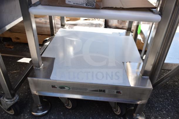 Face to Face Commercial Meat Slicer Equipment Stand, stainless steel, sturdy construction, on wheels for easy mobility.