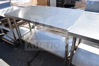 Commercial stainless steel table with under shelf, excellent condition, ideal for industrial or kitchen use.