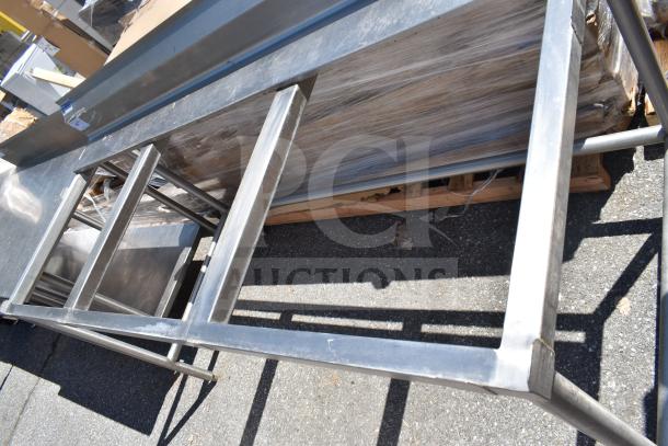 Universal Commercial Cutting Table Frame, stainless steel, sturdy construction, good condition, ideal for commercial use.