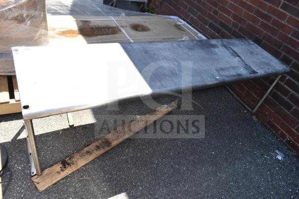 Commercial over shelf, stainless steel, weathered finish. Features durable metal construction, ideal for kitchen or storage use.