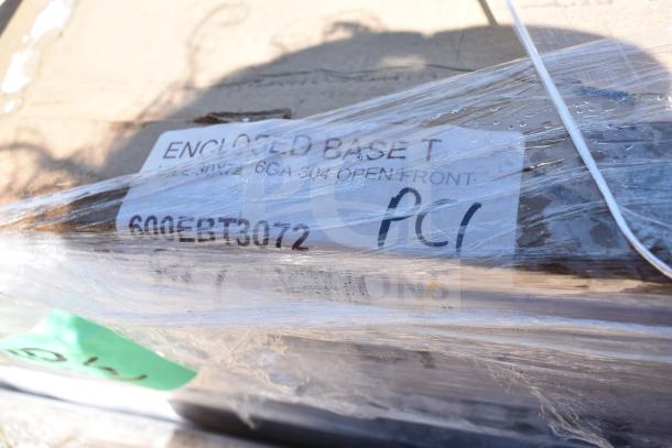 BRAND NEW SCRATCH AND DENT Regency 30" x 72" stainless steel table, enclosed base, open front, adjustable midshelf.