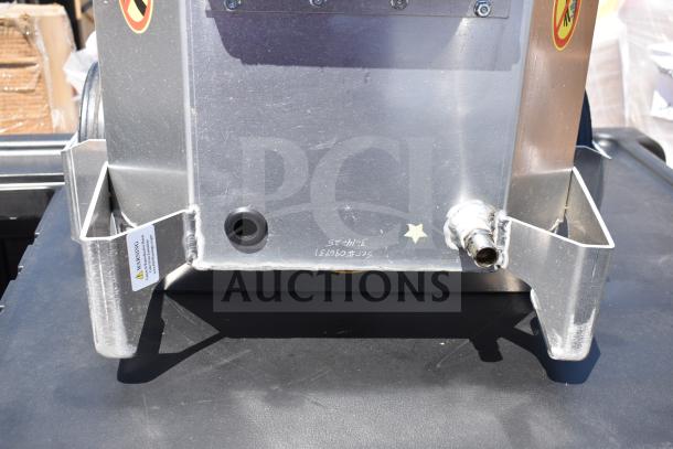 Brand new shortening shuttle pump with minor scratches. Visible warning labels, connectors, and "SCC #69467" marking.