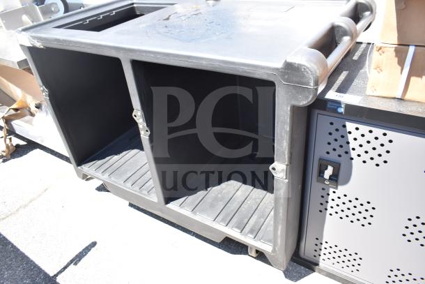 BRAND NEW Cambro CVC55110 Camcruiser vending cart in black with umbrella, scratch and dent, 1 counter well, 2 storage compartments.