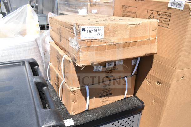 3 boxes of brand new cast iron table base components, including 164TCOLROD25 columns and 164TB2222 plates, slightly dented.