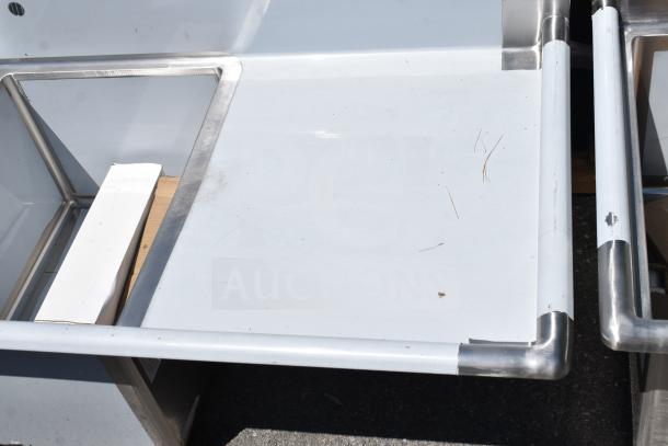 Brand new Regency 600S21824224 commercial 2-bay sink with dual drain boards, scratch and dent condition.