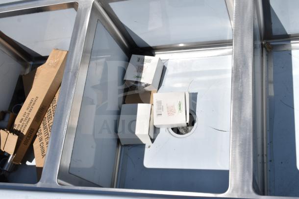 BRAND NEW SCRATCH AND DENT Regency 600S3182424R 3 Bay Sink with right drain board, minor surface marks visible.