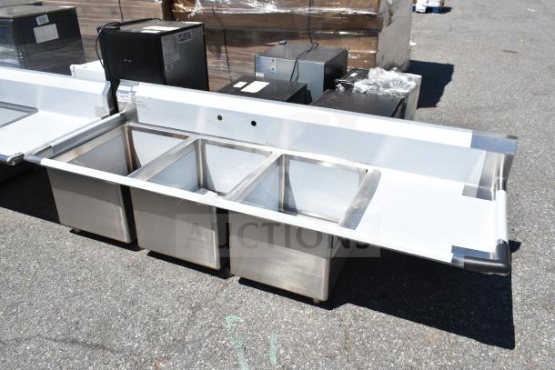 Brand new Regency 3-bay commercial sink with right side drain board, stainless steel. Minor scratches and dents visible.