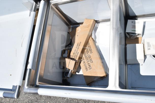 Regency 600S3182424R commercial 3 bay sink with right side drain board, new with scratches and dents, boxed accessories shown.