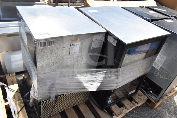 Two mini coolers, models Imbera EVC04-E1 and True GDM6-34-HC, wrapped on pallets. 120 Volts, 1 Phase.