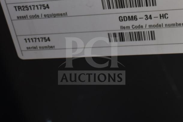 Label showing True GDM6-34-HC model number, asset code TR25171754, and serial number 11171754 for mini cooler.