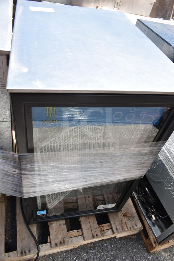 Two mini coolers on pallet, models Imbera EVC04-E1 and True GDM6-34-HC, wrapped in plastic. 120 volts, 1 phase.