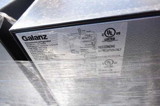 3 mini coolers including Galanz GL35BK. Visible label shows specs: 3.5 cu ft, 120 volts, freestanding only.