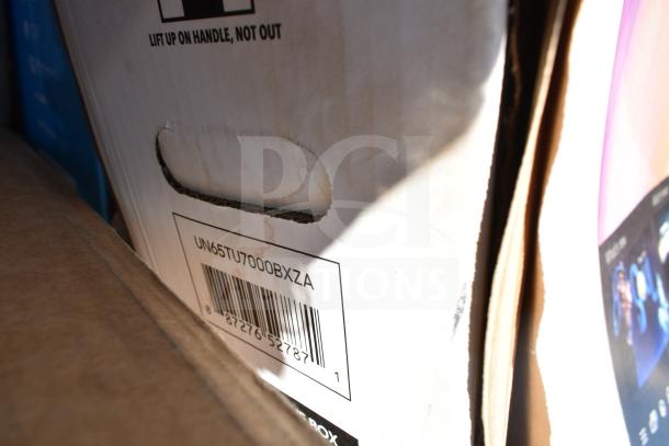 Five new scratch and dent items, including a sink. Box labeled UN65TU7000BXZA visible, indicating a Samsung TV model.