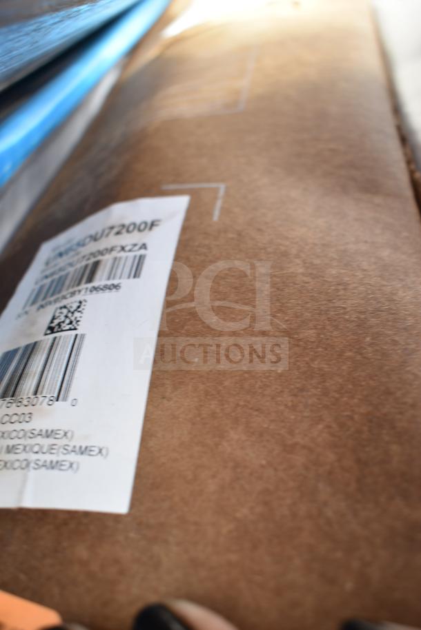 Alt text: Package label showing item code and barcode for scratch and dent items, including a sink. New condition.