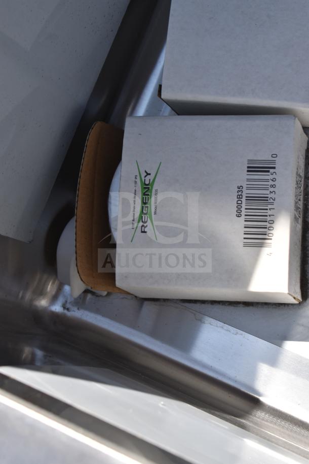 Regency 600S32323224 three-compartment commercial sink, new with box, visible branding, scratch, and dent condition.