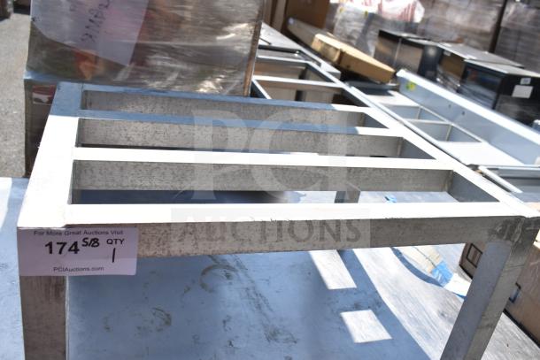 Commercial Dunnage Rack, metal construction, sturdy frame, used condition with scuff marks, auction label indicates item number and website.