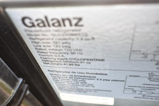 Close-up of label on Galanz GLR33MBKE02 cooler; shows specs: 120VAC, refrigerant R600a, net weight 41.89 lbs.