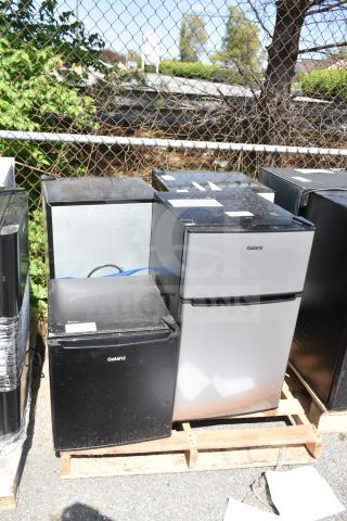 Four coolers, including Galanz GL17BK and GLR31TS1E02, 120V, 1 phase, various conditions, positioned on pallets.