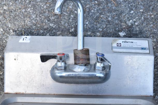Pantin Single Bay Wall Mount Sink with dual taps, stainless steel, visible NSF label, minor wear. Model TP-8000.