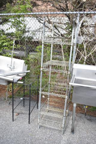 Metal shelving units, visible rust, five-tier open wire design. Buyer must dismantle, consider freight charges.