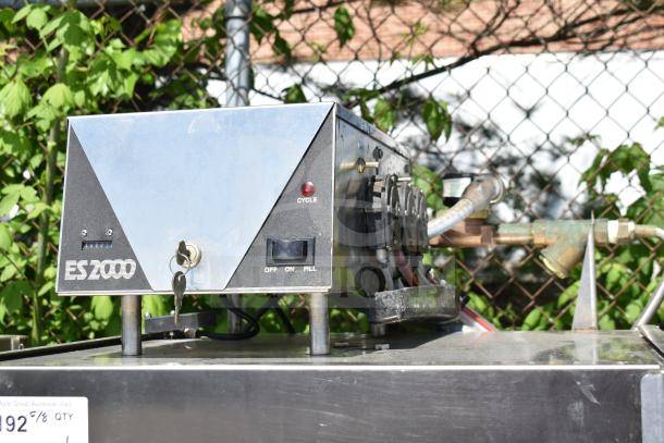 2017 Ecolab ES-2000 commercial pass-through dishwasher, 115 volts, 1 phase, control panel with cycle indicator, good condition.