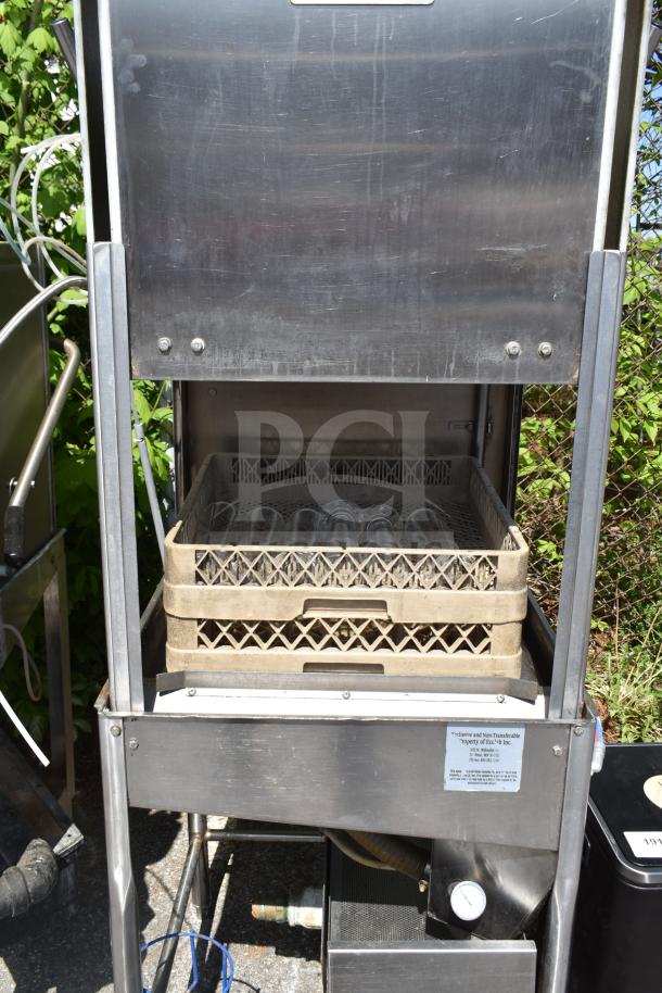 2017 Ecolab ES-2000 Commercial Dishwasher; straight pass-through, 115V, 1 phase, stainless steel, visible rack and label.