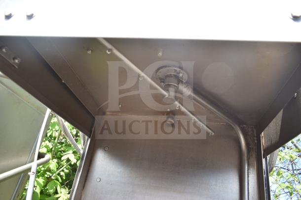 2017 Ecolab ES-2000 Commercial Dishwasher, stainless interior, straight pass-through design, 115V, 1 phase condition.