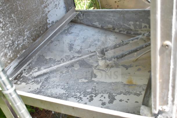 CMA EAH-2 commercial dishwasher interior, 120V, 1 phase. Shows signs of wear and calcium buildup on spray arms and surfaces.