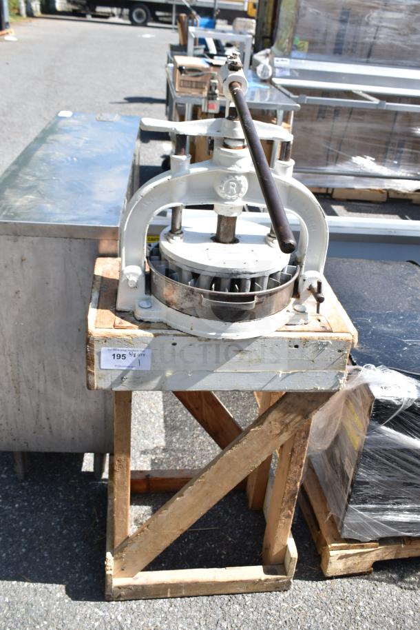 I. Kalfus Co commercial countertop dough divider on a wooden stand, metal construction, visible wear, auction label attached.