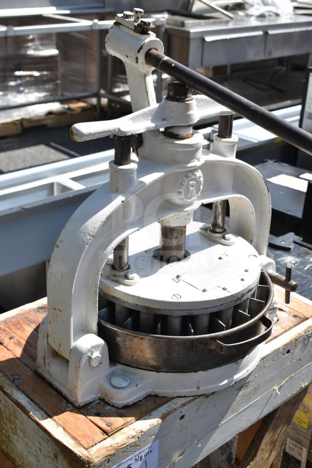 I. Kalfus Co commercial countertop dough divider on wooden stand, industrial-grade, sturdy, with visible wear.