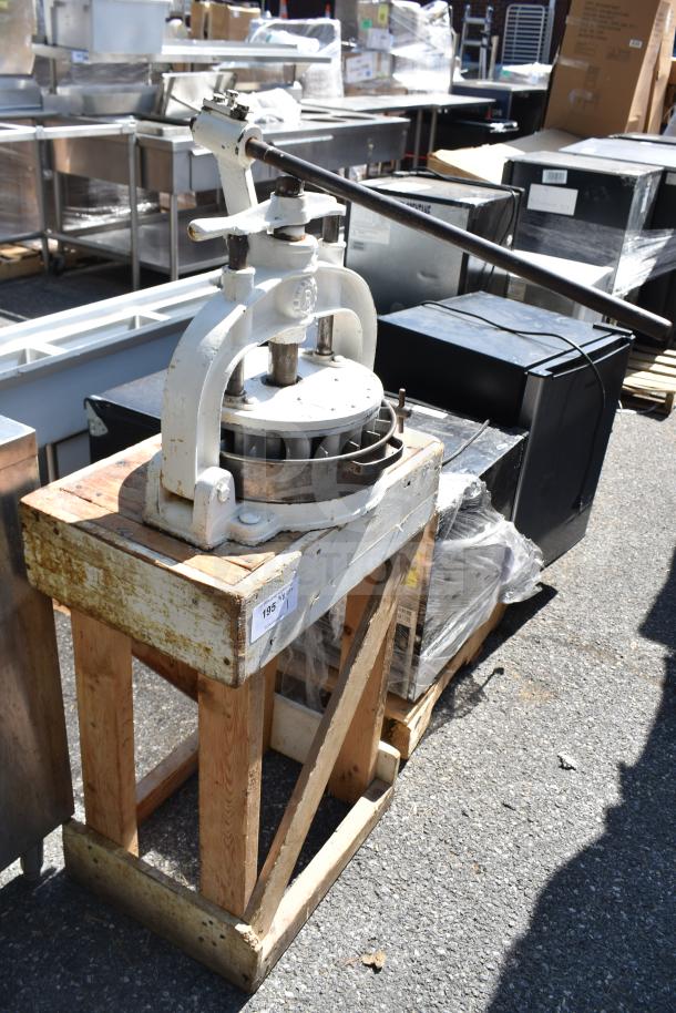 I. Kalfus Co commercial countertop dough divider on wooden stand; features metal components, visible wear, and auction tag #195.