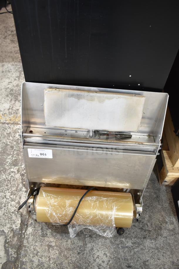 Countertop wrapping station, 120 volts, 1 phase, stainless steel, moderate use, visible roller and power cord.