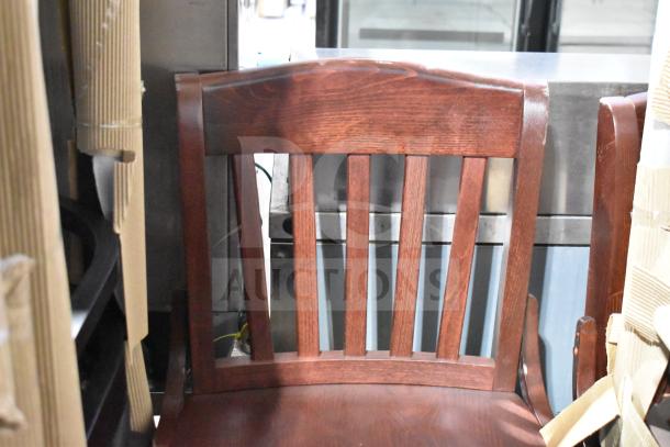 Wooden bar-height chair, brand new with minor scratches and dents, featuring a slatted backrest and rich finish.