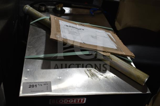 Brand new Blodgett BLCT-6E stainless steel countertop convection oven, 208 volts, 3 phase, with visible scratches.