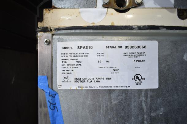 Manitowoc SD0452A Ice Machine Head on SPA310 Dispenser, 115V, 1 Phase, tag shows model and serial number details.