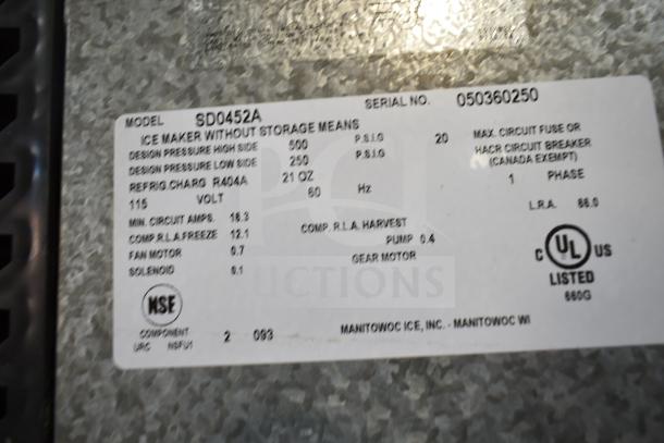 Manitowoc SD0452A Ice Machine with SPA310 Dispenser, 115V, 1 Phase. Label shows model info and specifications.